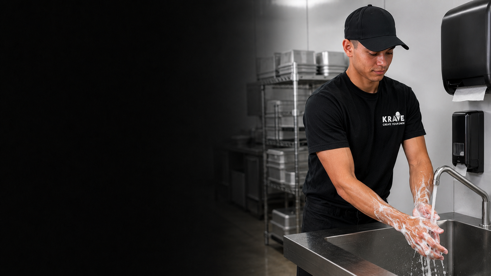 A Krave employee at a designated handwashing sink with running water, soap, and paper towels available