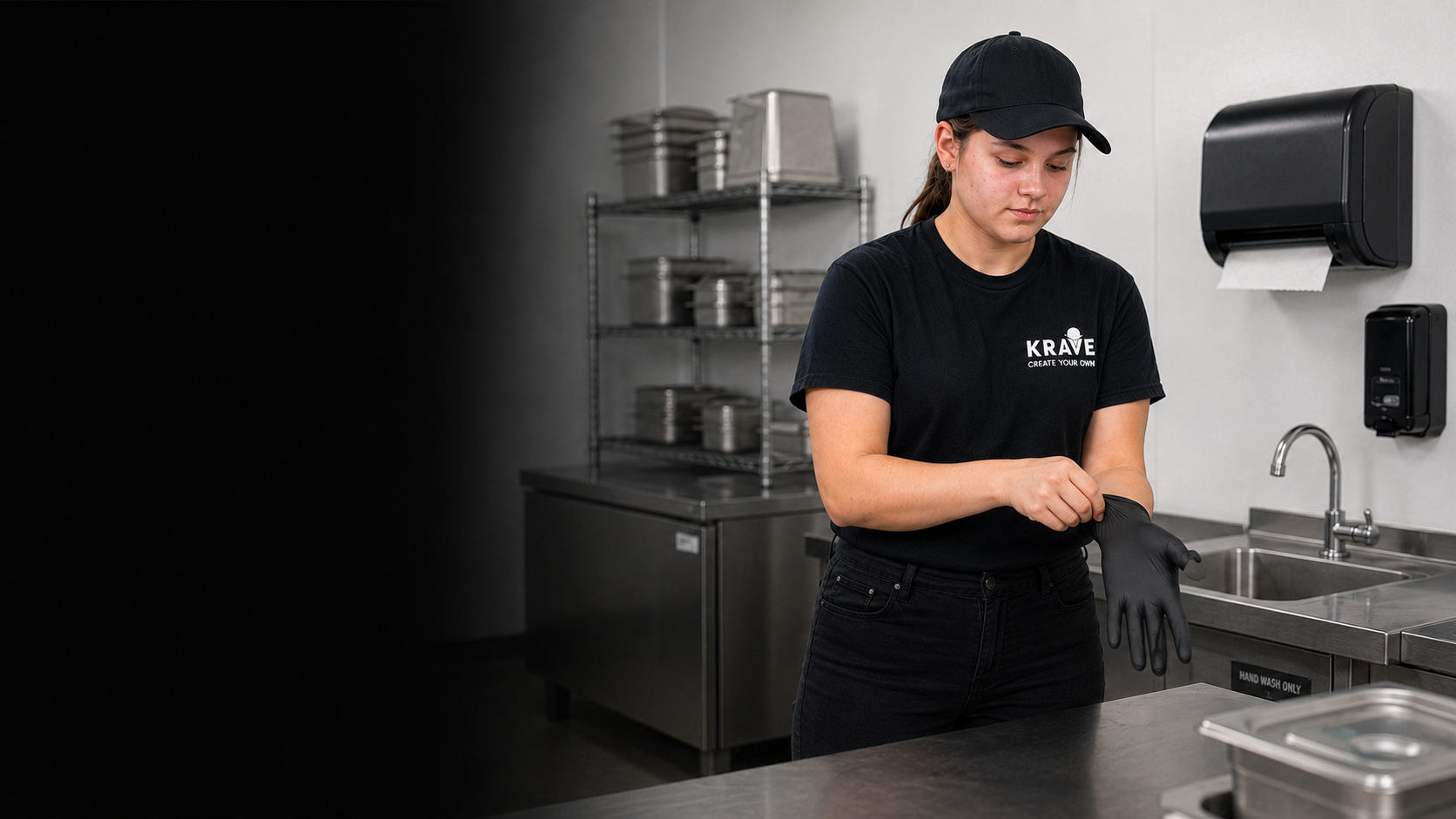 A teenage Krave employee putting on fresh single-use gloves