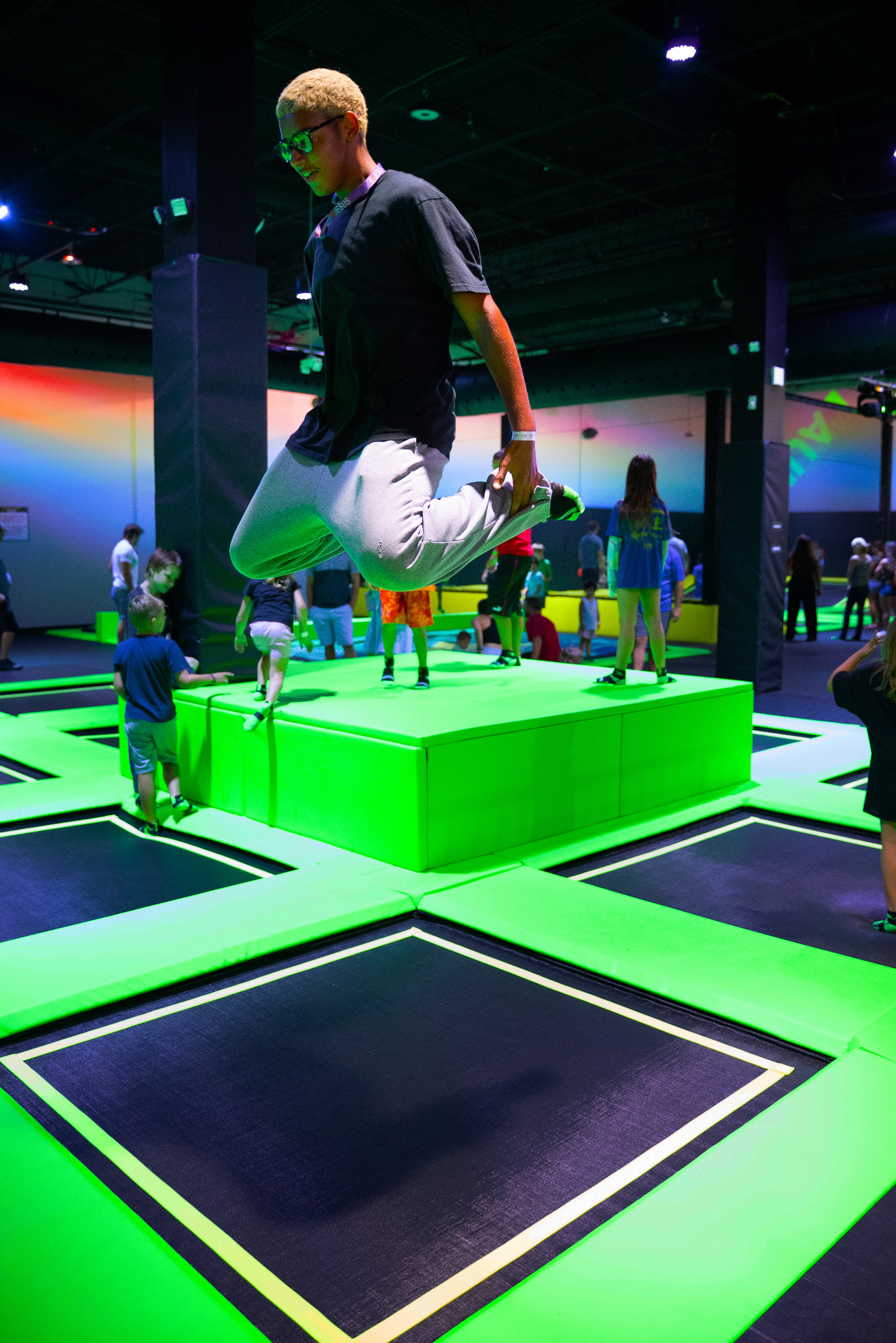 Guest using a Launch trampoline attraction