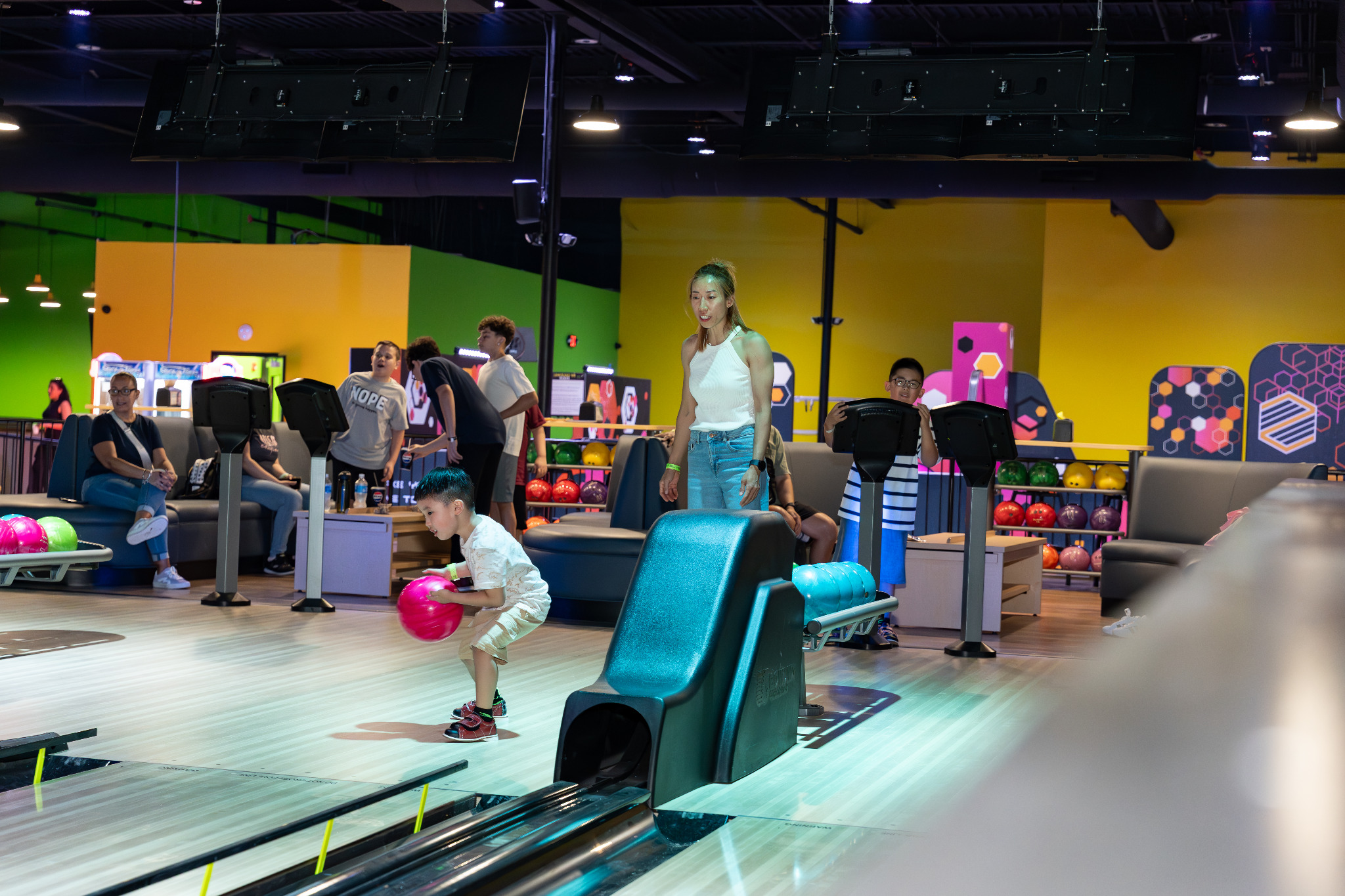 Guests enjoying a Launch bowling attraction